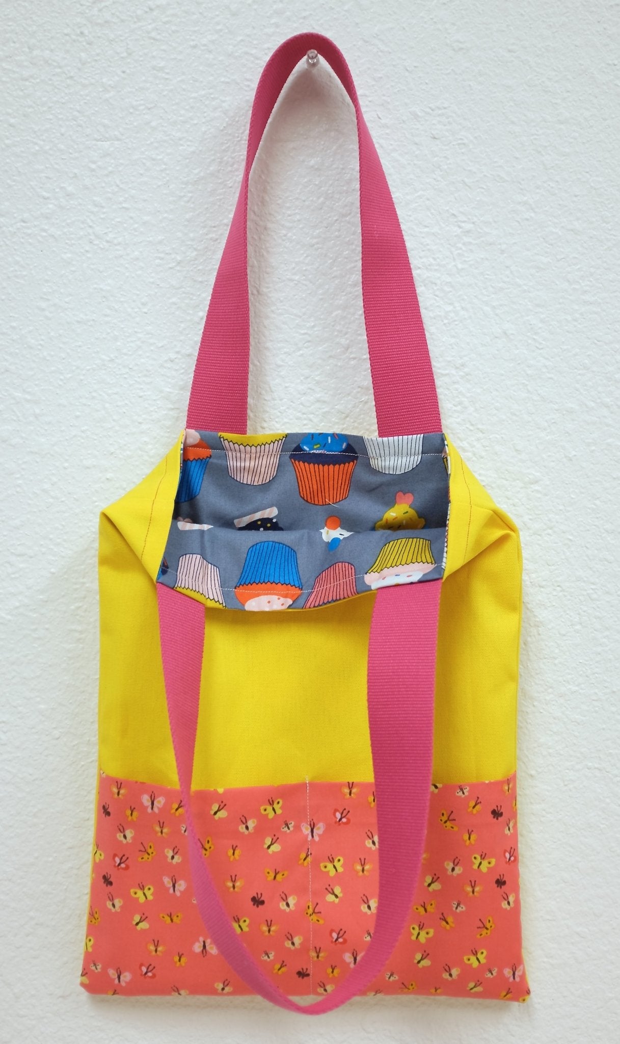 Alternate colorway of Sewing 101 tote bag featuring bold fabrics and contrasting straps.
