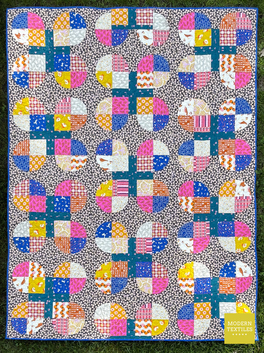 Clover Quilt – Throw Size | Modern Drunkard’s Path Design
