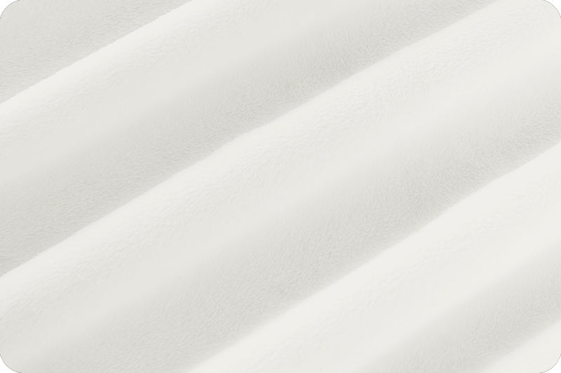 Large image of soft minky in white color, folded onto itself to show dimension.