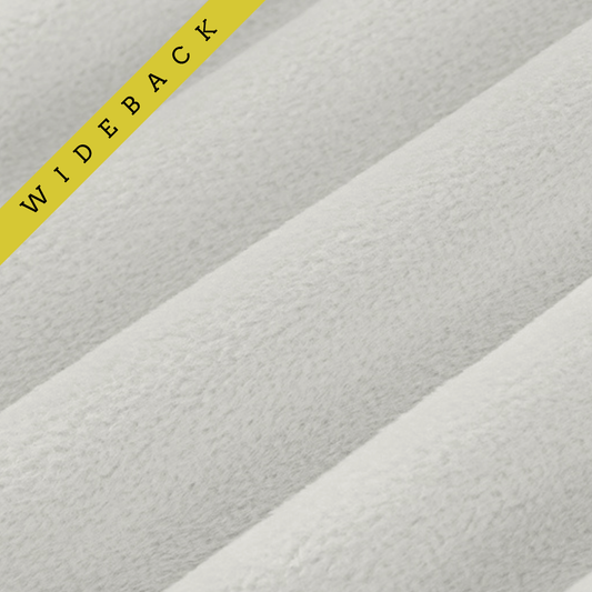 Soft 90 wide minky in light to medium grey color, folded onto itself to show dimension. Text overlay of Wideback in corner.