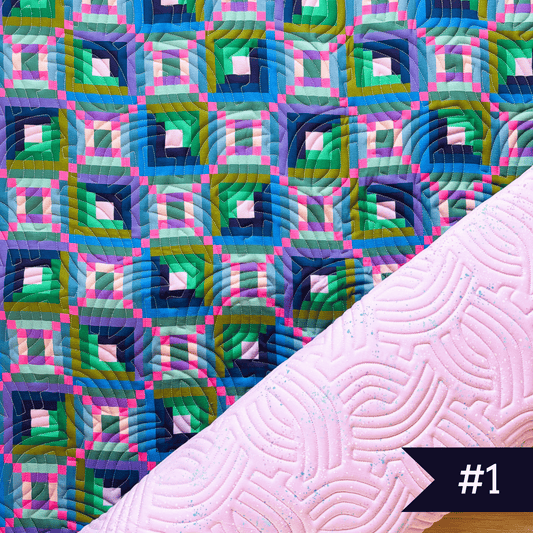 Quilted fabric using Canva and Co fabric with speckled fabric in light purple with echoed curves quilting design. #1 noted in lower right corner.