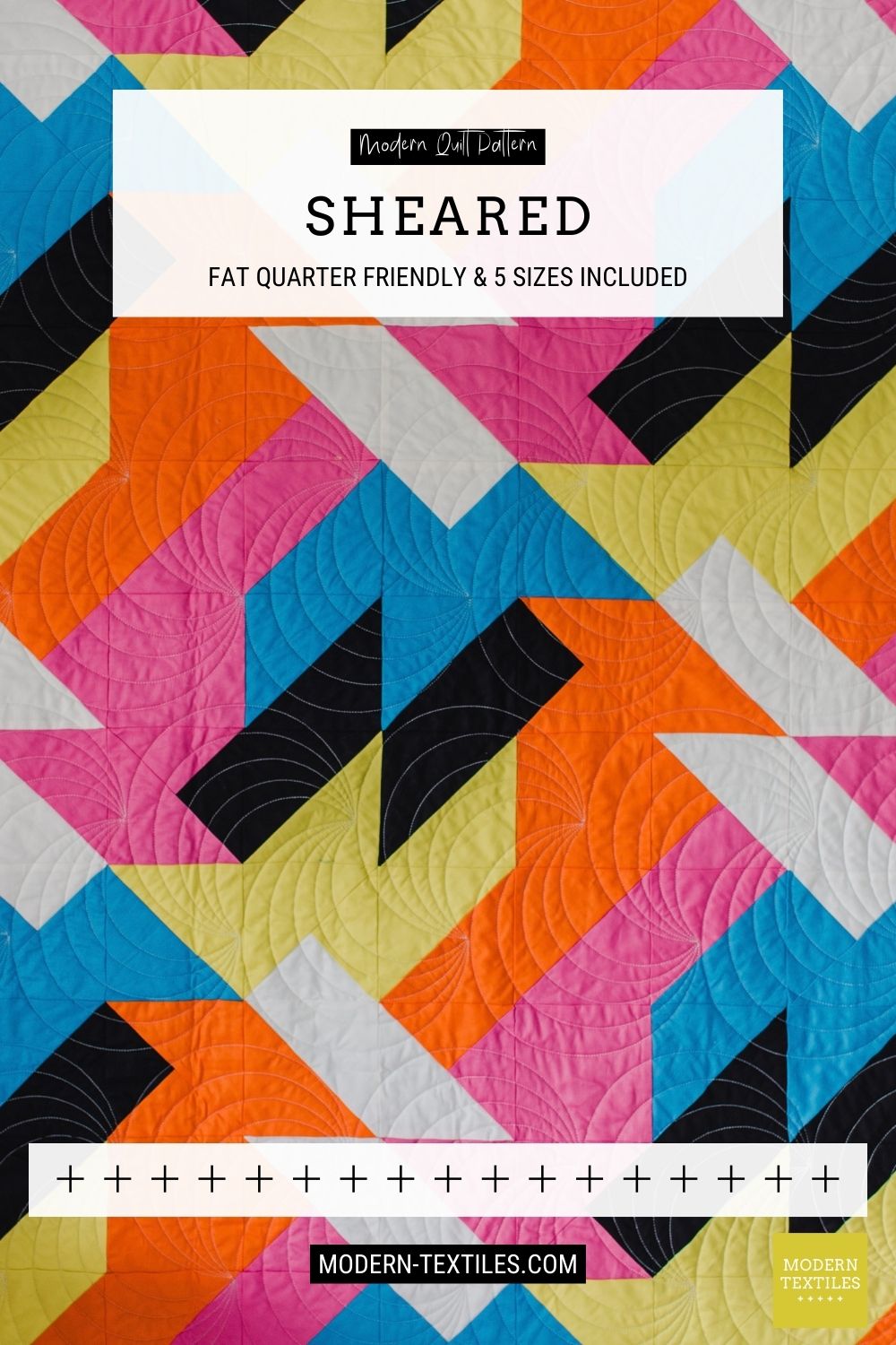 Colorful geometric modern quilt with text overlay stating "Sheared" on a textured quilt background.