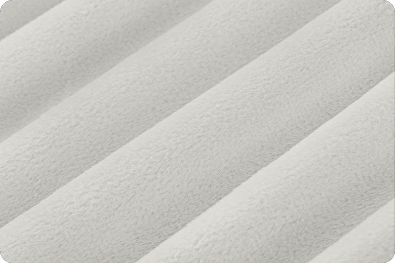Soft 90 wide minky in light to medium grey color, folded onto itself to show dimension.