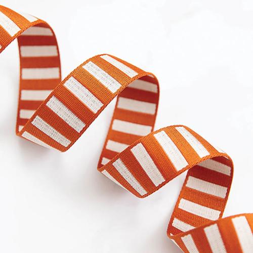 Amber color and off white striped webbing on a white background.