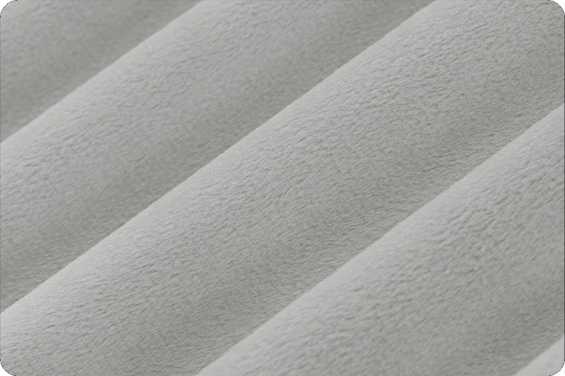 Soft 90 wide minky in medium grey color, folded onto itself to show dimension.