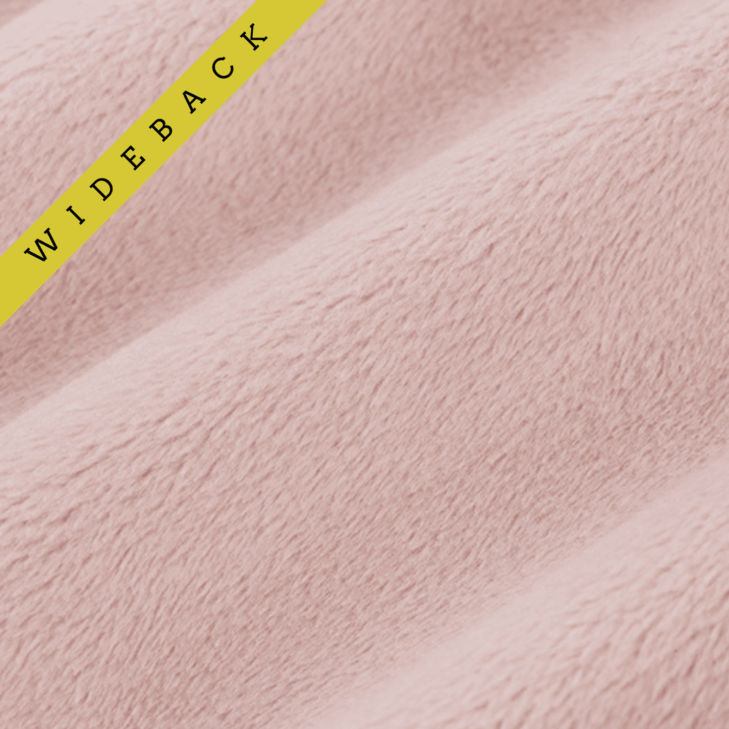 Close up of light pink minky fabric with diagonal text in upper left corner stating wideback.